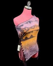 Load image into Gallery viewer, A multicolor shawl with a mountain landscape print, draped on a pink mannequin torso against a black background.
